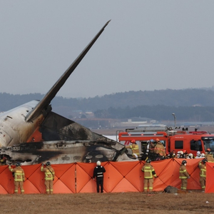 韓國(guó)客機(jī)起火已致62人死亡